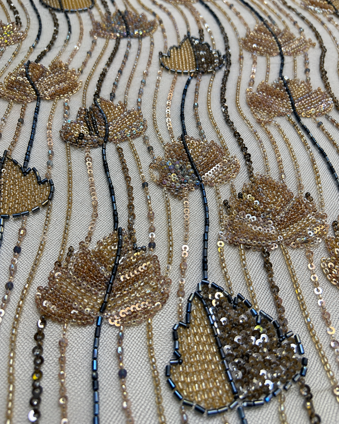 Embellished Net Fabric – Cream & Champagne Gold Tulip Bud Scatter on Wavy Vertical Seed Bead & Sequin Stripe Ground with Gunmetal Bugle Bead Accents - Image 3