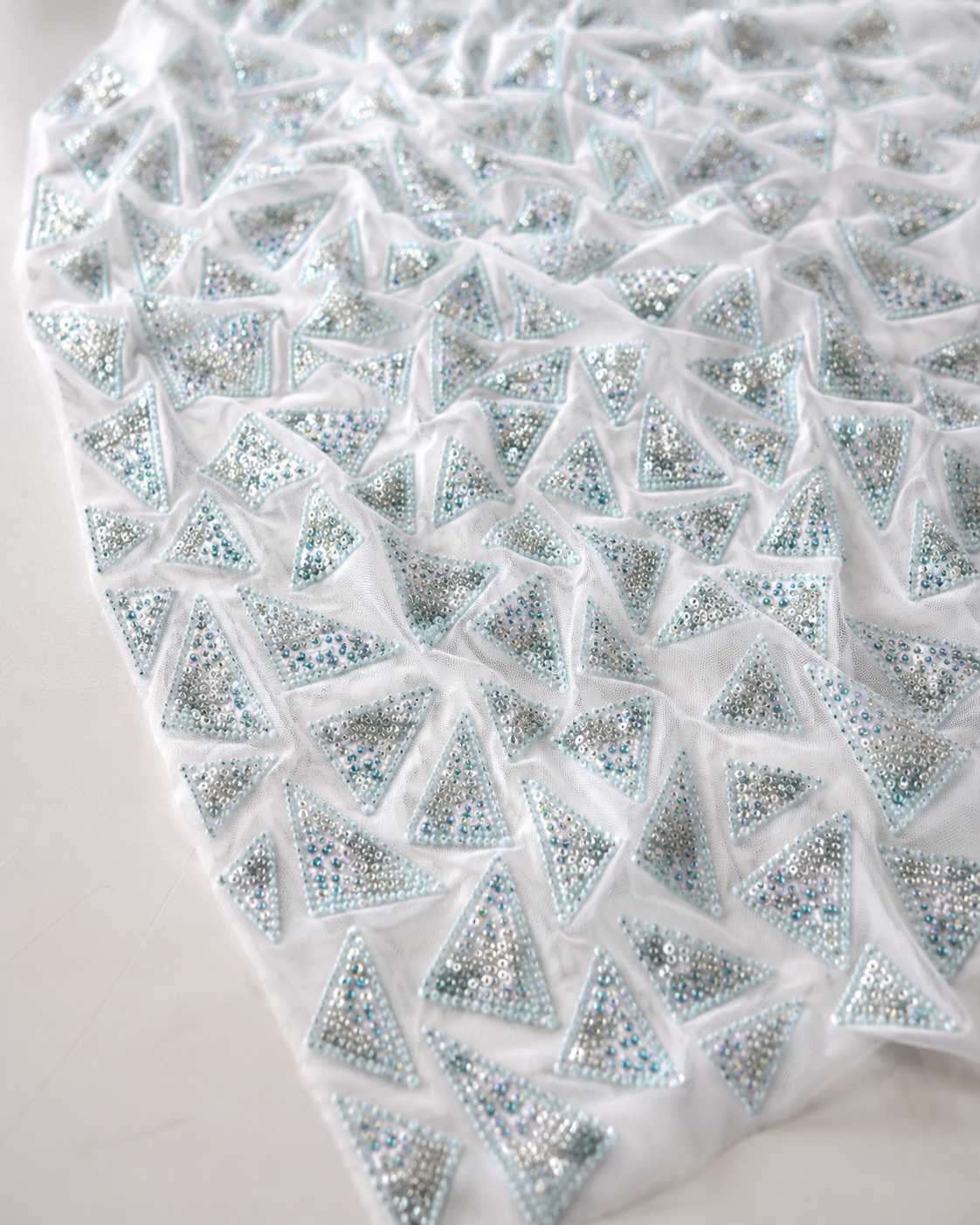 Embellished Net Fabric – White & Ice Blue All-Over Triangle Geometric Seed Bead & Sequin Scatter - Image 2
